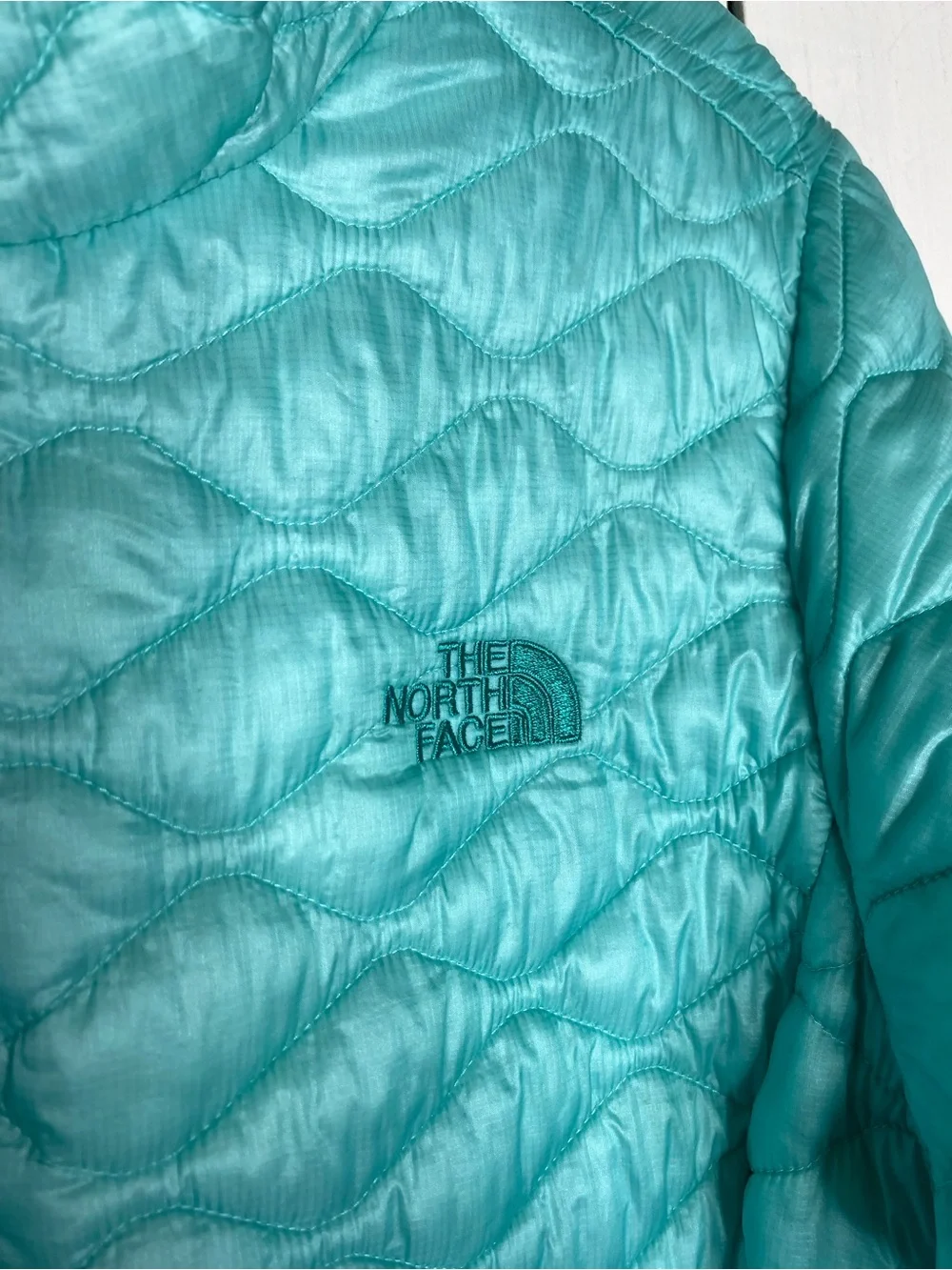 The North Face zip up puffer jacket size large